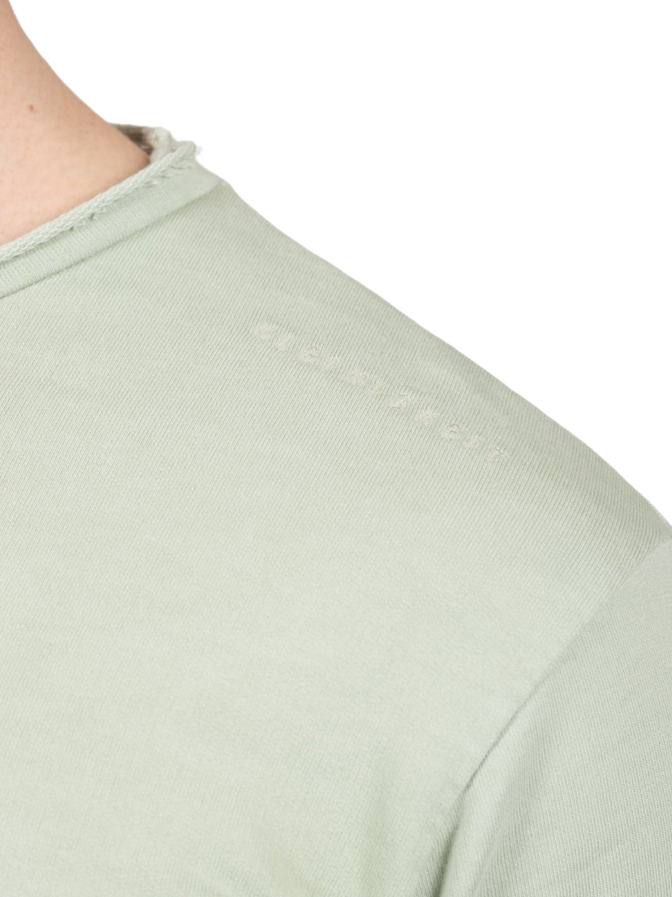 Kleinigkeit T-Shirt Leonardo Dikaputtio bei Robert Ley
